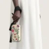 Aftenclutch med blomsterbroderier og sløjfe