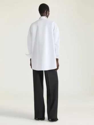 Asymmetrisk skjorte i poplin med pailletter