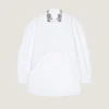 Asymmetrisk skjorte i poplin med pailletter Asymmetrisk skjorte i poplin med pailletter