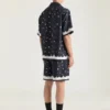 Bermudashorts i silke med blomsterprint Bermudashorts i silke med blomsterprint
