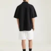 Skjorte i scuba med Givenchy Paris-patch