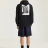 Couture Seam-hoodie i fleece med klapperbræt-print