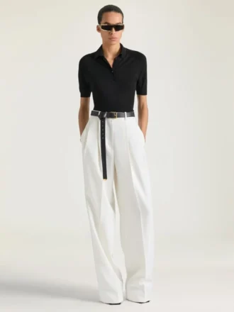 Kort polo i strik med second skin-effekt Kort polo i strik med second skin-effekt