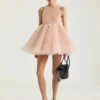 Mini-babydoll-kjole med nylonflæser Mini-babydoll-kjole med nylonflæser