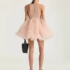 Mini-babydoll-kjole med nylonflæser Mini-babydoll-kjole med nylonflæser