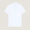 Polo i piqué-bomuld med Givenchy Paris-broderi Polo i piqué-bomuld med Givenchy Paris-broderi