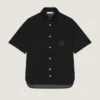 Skjorte i scuba med Givenchy Paris-patch