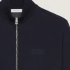 Sweatshirt med lynlås i uld og kashmir med Givenchy-patch Sweatshirt med lynlås i uld og kashmir med Givenchy-patch